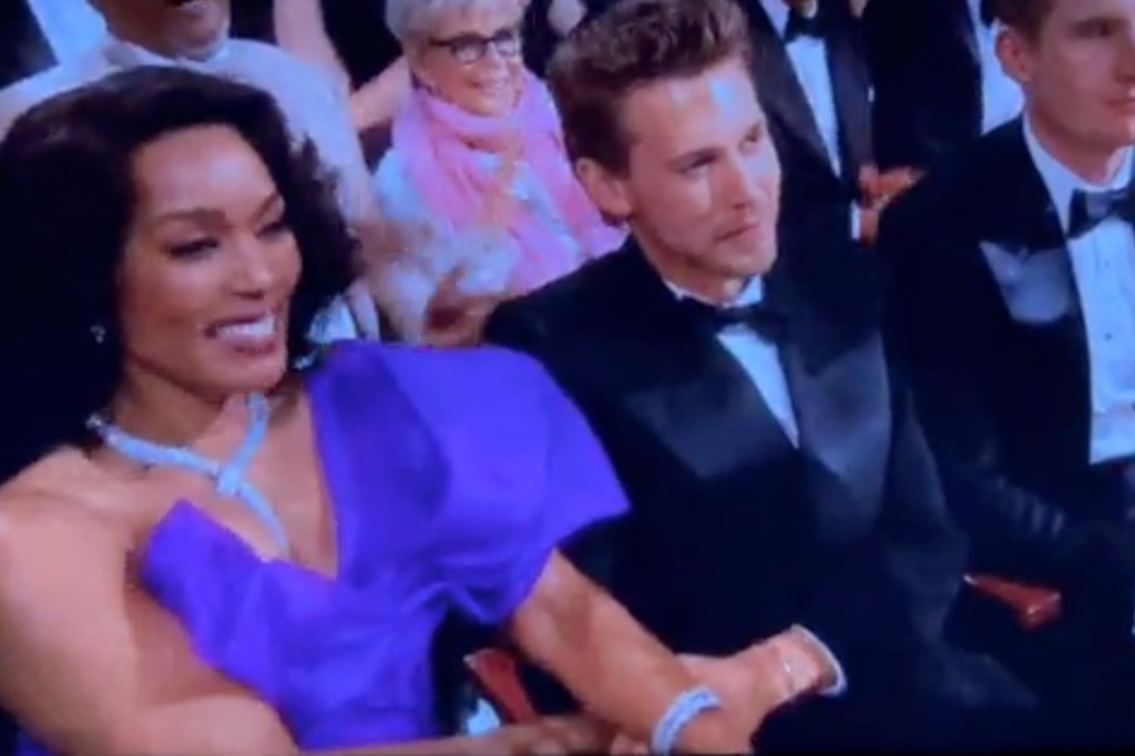 A video of actress Angela Bassett holding Austin Butler's hand at the 2023 Oscars has gone viral.
