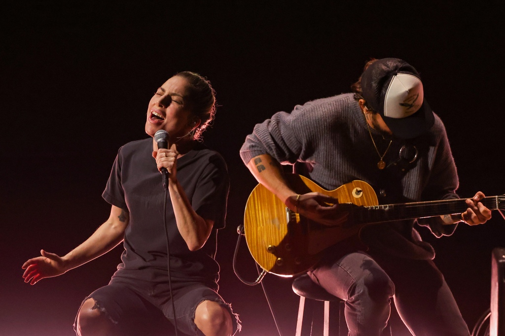 The singer performed the song "Hold My Hand" from the movie "Top Gun: Maverick" in a t-shirt and ripped jeans on stage.  