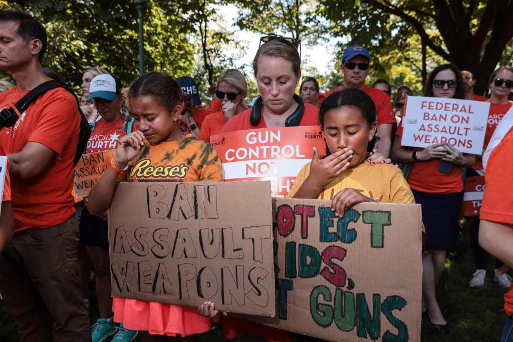 ​Survivors, victims' family members and advocates rally for strictrer gun control measures in Washington, D.C., in July 2022, following mass shootings ​in Highland Park, Ill., and ​in an elementary school in Uvalde, Texas. 