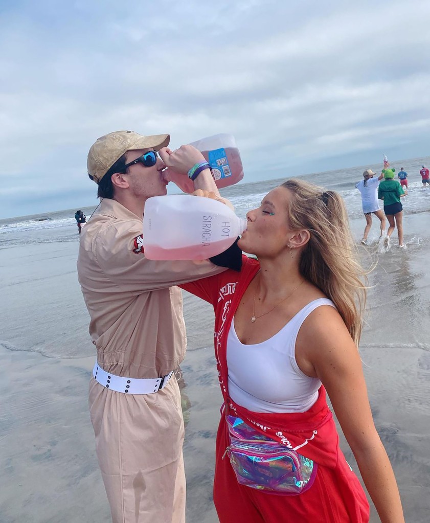 Liza Burke takes a chug from a large container