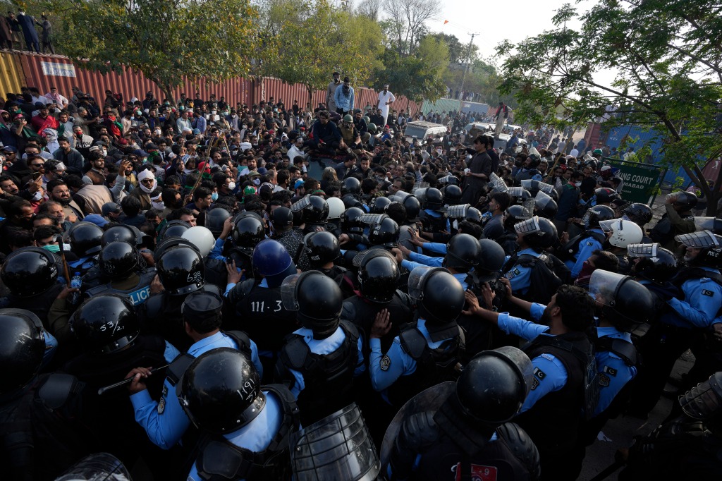 Khan's supporters clash with the police