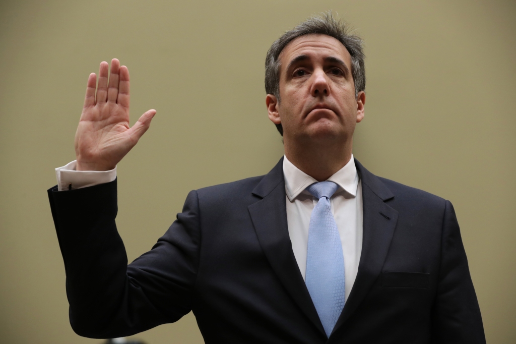 Michael Cohen, Donald Trump's former attorney and fixer, made the $130,000 payment to Stormy Daniels. He is pictured testifying before the House Oversight Committee in February 2019. 