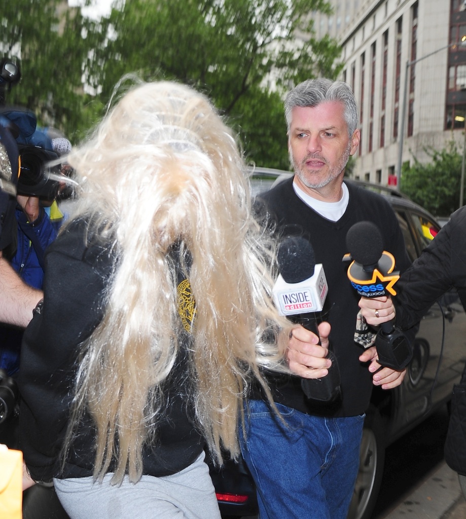 Amanda Bynes departs Manhattan Central Booking after being arrested on May 23, 2013, for alleged charges of reckless endangerment, tampering with evidence, and criminal possession of marijuana. 