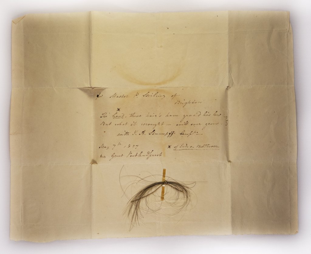 A letter and hair