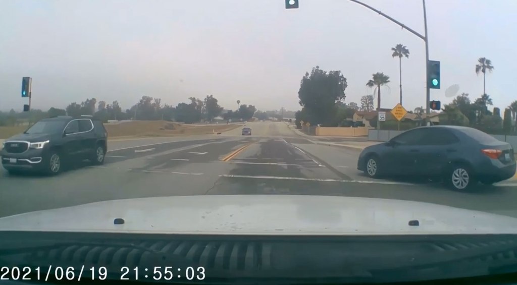 One of the dashcam videos shows the driver nearly crashing into another vehicle at an intersection.