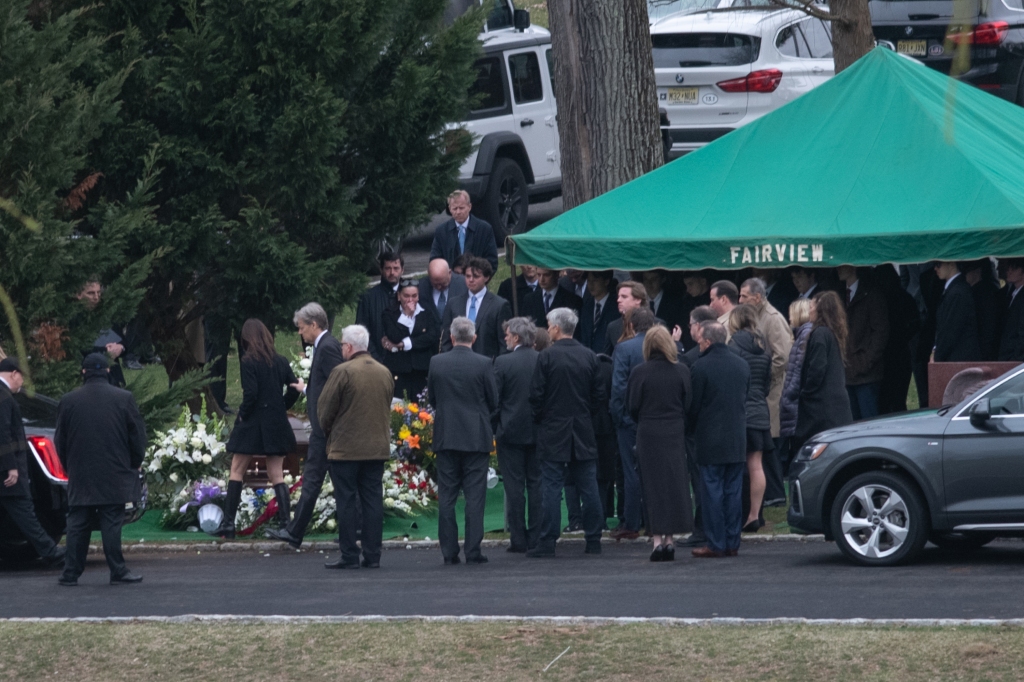 Mourners at the Fairview Cemetery & Arboretum where 19-year-old Henry Meacock was laid to rest.