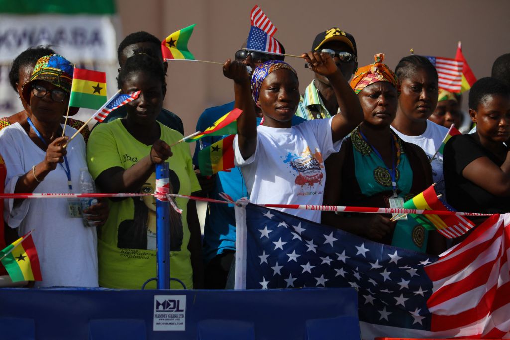 Audience members await remarks by Vice President Kamala Harris in Independence Square in Accra, Ghana. 