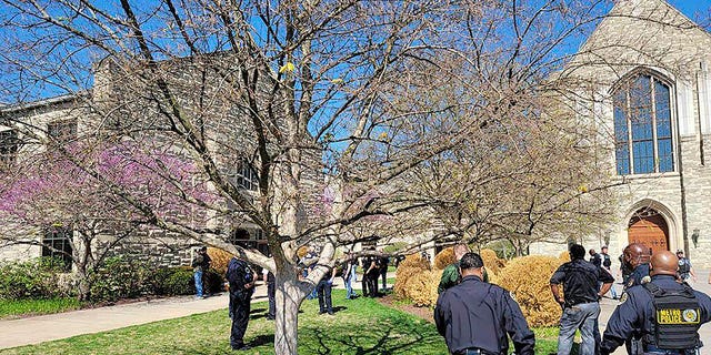 This photo provided by the Metro Nashville Police Department shows officers at an active shooter event that took place at Covenant School, Covenant Presbyterian Church, in Nashville, Tenn. Monday, March 27, 2023.