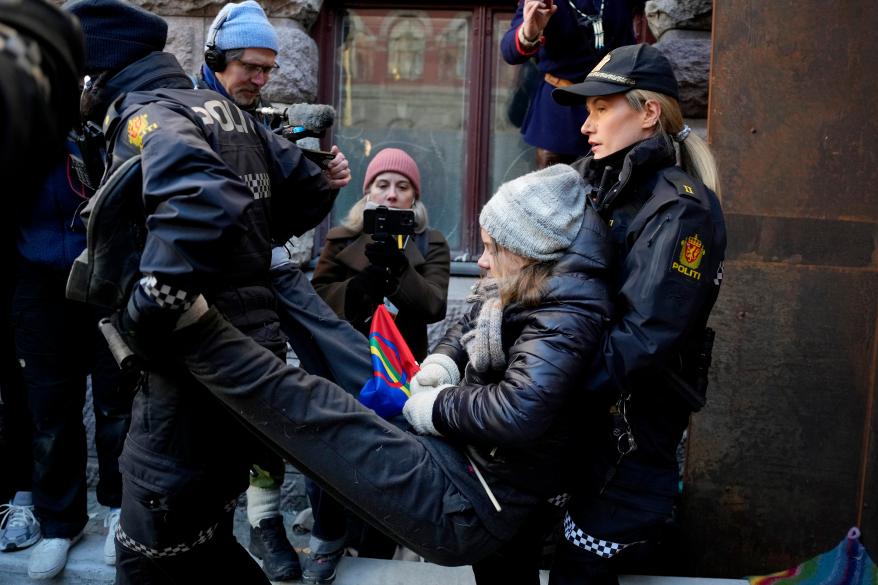 Swedish activist Greta Thunberg is carried away during a protest outside the Norwegian Ministry of Finance, in Oslo, on March 1, 2023.