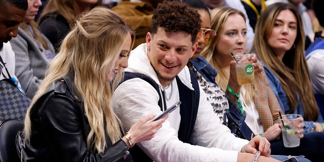 Kansas City Chiefs quarterback Patrick Mahomes and wife Brittany Mahomes sit courtside during a game between the Dallas Mavericks and the Los Angeles Lakers at the American Airlines Center Feb. 26, 2023, in Dallas, Texas.