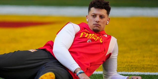 Patrick Mahomes #15 of the Kansas City Chiefs stretches against the Philadelphia Eagles after Super Bowl LVII at State Farm Stadium on February 12, 2023 in Glendale, Arizona.