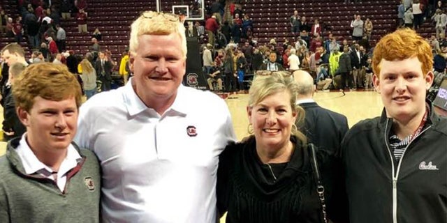 Paul, Alex, Maggie and Buster Murdaugh at a sporting event. Alex was convicted of fatally shooting his wife and son.