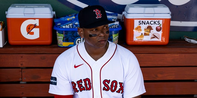 Rafael Devers #11 of the Boston Red Sox reacts before a Spring Training Grapefruit League game against the Tampa Bay Rays on February 26, 2023 at jetBlue Park at Fenway South in Fort Myers, Florida.