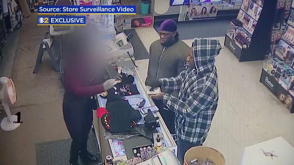 Brothers Abimbola and Olabinjo Osundairo are seen on video surveillance buying supplies at an Ace Hardware store Jan. 28, 2019, in Chicago.