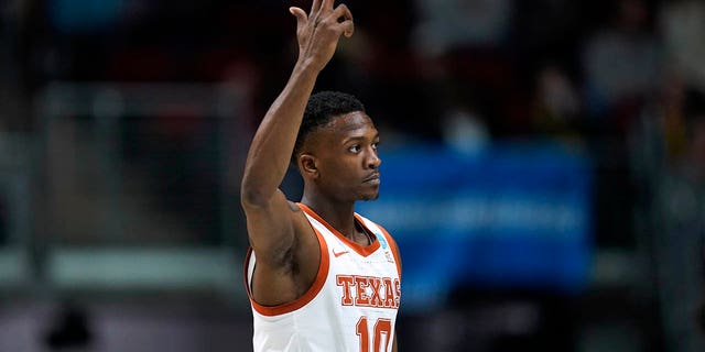 Texas guard Sir'Jabari Rice celebrates after making a 3-point basket in the first half of a first-round college basketball game against Colgate in the NCAA Tournament, Thursday, March 16, 2023, in Des Moines, Iowa. 