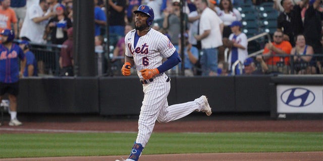 New York Mets' Starling Marte runs the bases after his first-inning home run during a baseball game against the Cincinnati Reds, Monday, Aug. 8, 2022, in New York.