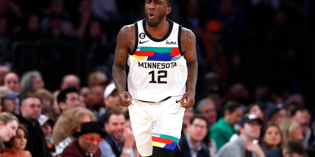 Minnesota Timberwolves forward Taurean Prince (12) reacts after making a 3-point basket against the New York Knicks during the second half of an NBA basketball game, Monday, March 20, 2023, in New York.