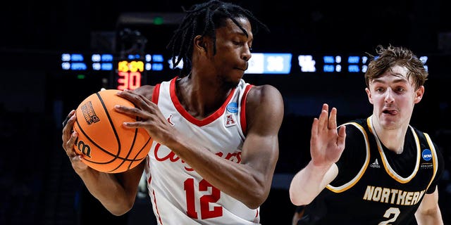 Houston guard Tramon Mark (12) grabs rebound away from Northern Kentucky guard Sam Vinson (2) during the second half of a first-round college basketball game in the men's NCAA Tournament in Birmingham, Ala., Thursday, March 16, 2023.