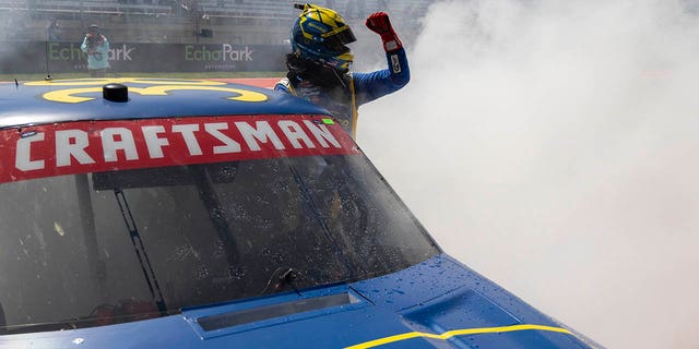 Zane Smith celebrates winning the NASCAR Truck Series auto race at Circuit of the Americas, Saturday, March 25, 2023, in Austin.