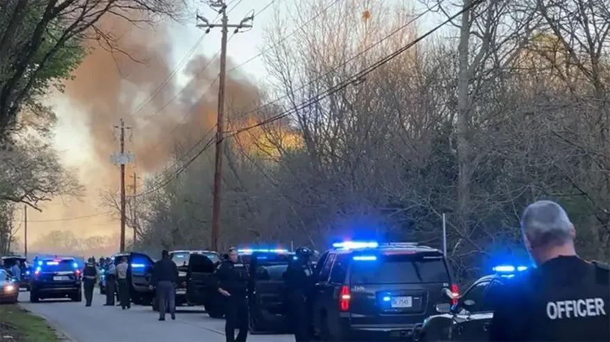 Cops are spotted at the scene, as they respond to the protest attacks near the future police training facility on March 5, 2023 in Atlanta, Georgia.