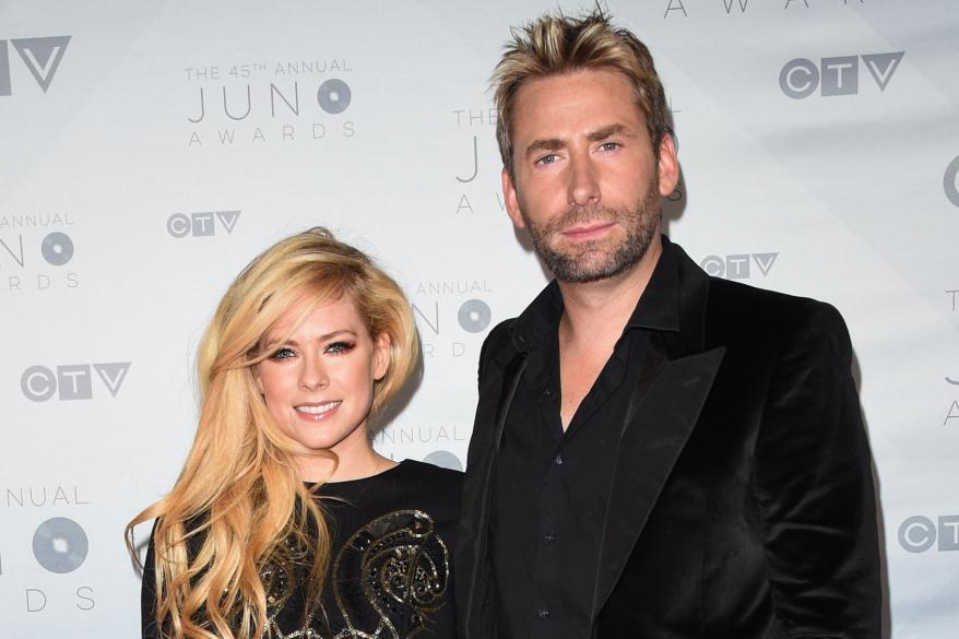 CALGARY, ALBERTA - APRIL 03: Recording artists Avril Lavigne (L) and Chad Kroeger arrive at the 2016 Juno Awards at Scotiabank Saddledome on April 3, 2016 in Calgary, Canada. (Photo by George Pimentel/Getty Images)