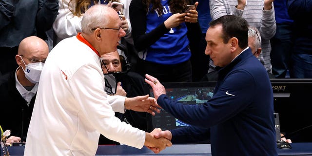 Head coach Jim Boeheim, left, of the Syracuse Orange talks with head coach Mike Krzyzewski of the Duke Blue Devils following a game at Cameron Indoor Stadium Jan. 22, 2022, in Durham, N.C.