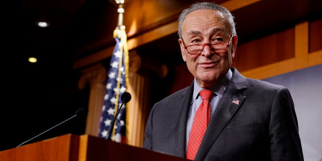 Senate Majority Leader Chuck Schumer, D-N.Y., speaks to reporters on Dec. 7, 2022.