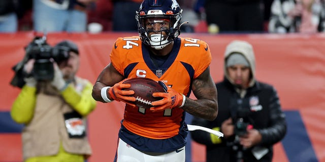 Courtland Sutton of the Broncos catches a touchdown pass against the Los Angeles Chargers at Empower Field At Mile High on Jan. 8, 2023, in Denver.