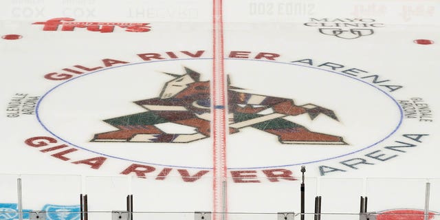 The Arizona Coyotes kachina logo at center ice before a game against the St. Louis Blues Oct. 18, 2021, at Gila River Arena in Glendale, Ariz. 