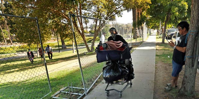 During the  Echo Park cleanup, crews removed 723.5 pounds of biological waste and 300 pounds of hazardous waste.