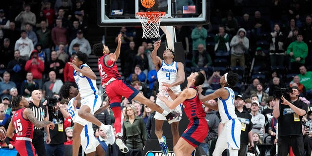 Florida Atlantic guard Nicholas Boyd (2) hits the game winning basket against the Memphis Tigers in the second half of a first-round college basketball game in the NCAA Tournament Friday, March 17, 2023, in Columbus, Ohio. Florida Atlantic won 66-65.