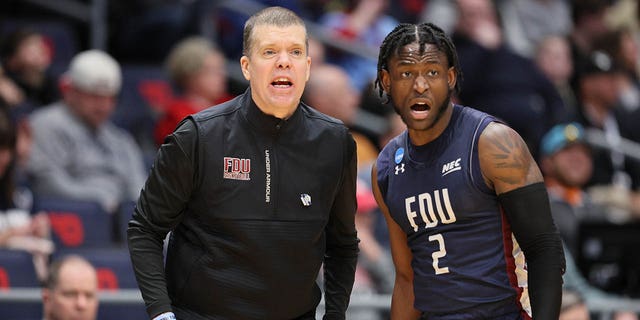 Head coach Tobin Anderson and Demetre Roberts (2) of the Fairleigh Dickinson Knights during the second half against the Texas Southern Tigers in a First Four game of the NCAA men's basketball tournament at University of Dayton Arena March 15, 2023, in Dayton, Ohio. 