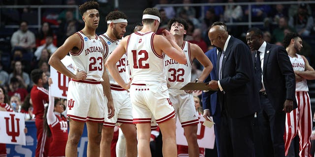 Head coach Mike Woodson of the Indiana Hoosiers speaks to his team in the first half against the Kent State Golden Flashes during the first round of the NCAA Men's Basketball Tournament at MVP Arena on March 17, 2023 in Albany, New York.