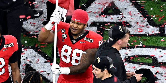 Jalen Carter #88 of the Georgia Bulldogs celebrates after defeating the TCU Horned Frogs in the College Football Playoff National Championship game at SoFi Stadium on January 09, 2023 in Inglewood, California. Georgia defeated TCU 65-7.