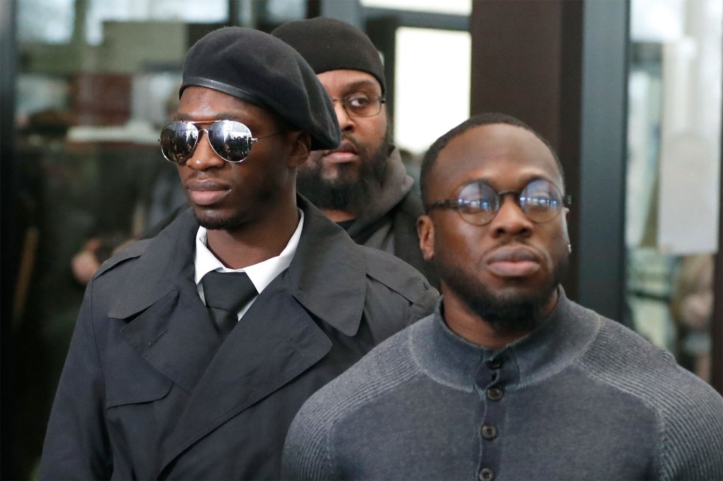 Olabinjo Osundairo, right, and Abimbola Osundairo appear outside the Leighton Criminal Courthouse in Chicago on Feb. 24, 2020. 