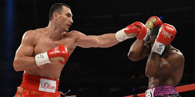 Wladimir Klitschko, left, of Ukraine and Bryant Jennings of the U.S. exchange punches during their world heavyweight championship fight April 25, 2015, at Madison Square Garden in New York.