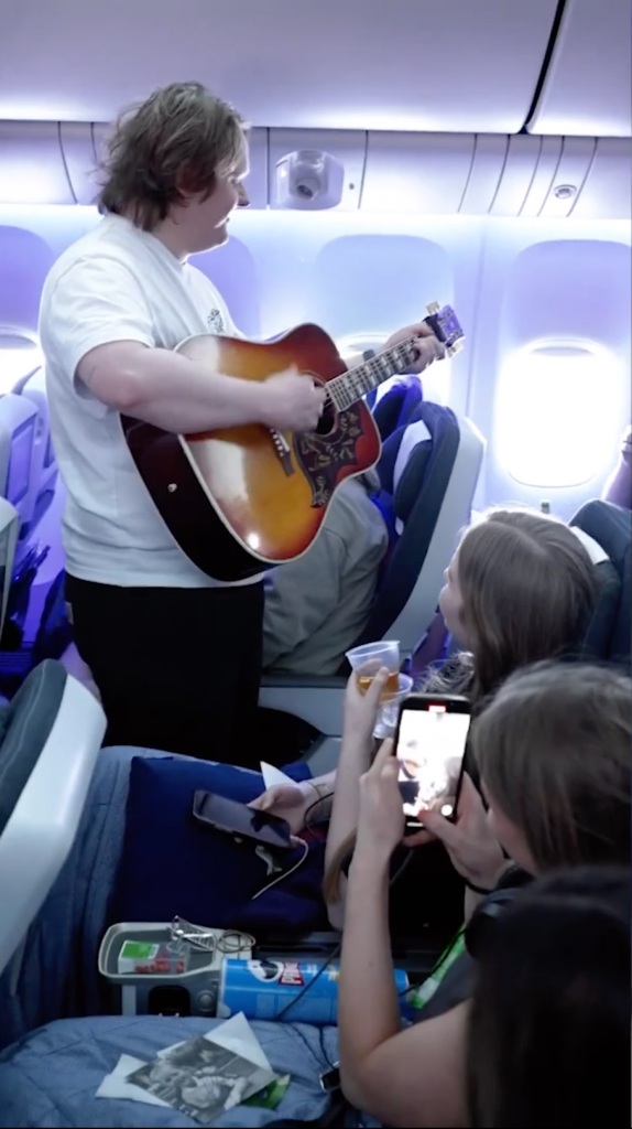 The new song the Scottish singer sang for the flight is called “Wish You The Best.” 
