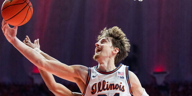 Matthew Mayer, #24 of the Illinois Fighting Illini, reaches for the ball during the game against the Indiana Hoosiers at State Farm Center on Jan. 19, 2023 in Champaign, Illinois. 