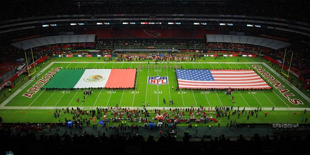 The singing of the national anthem prior to a game between the San Francisco 49ers and Arizona Cardinals at Estadio Azteca on November 21, 2022, in Mexico City, Mexico. 