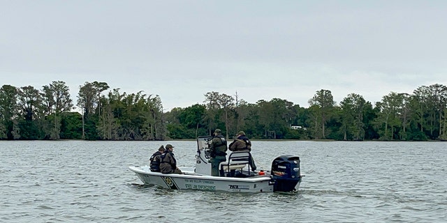 Searchers used sonar and an underwater drone to locate the bodies, which were found about 300 to 400 yards offshore near the bottom of the lake.