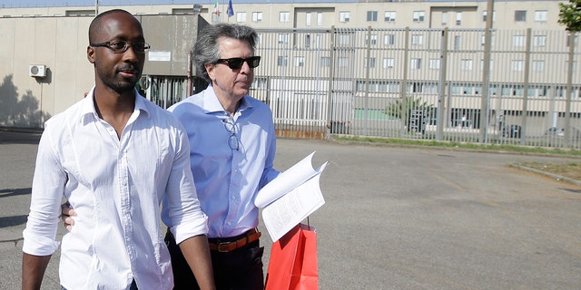 Rudy Guede, 35, left, was convicted of Meredith Kercher's murder along with Amanda Knox and Raffaele Sollecito in 2009 and then released in 2020 after serving 13 years of a 30-year term, according to the Mail. 