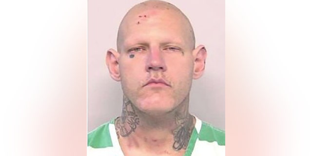 Rufus A. Phelps IV, 32, is wanted as a suspected accomplice in connection with the alleged murder.