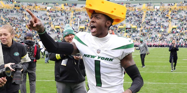 Sauce Gardner of the New York Jets celebrates after the Jets beat the Green Bay Packers 27-10 at Lambeau Field Oct. 16, 2022 in Green Bay, Wis.