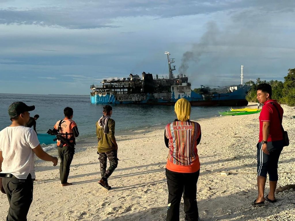 A MV Lady Mary Joy passenger vessel sits on the shore of Basilan island, southern Philippines, on March 30, 2023. 