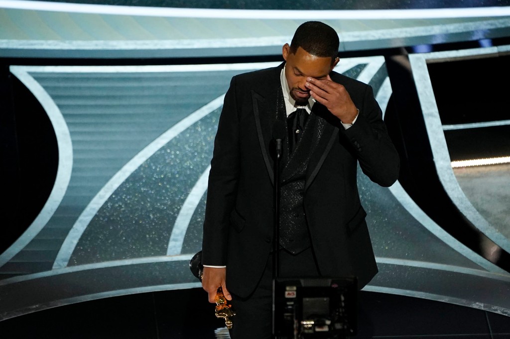 Will Smith wipes away tears during his acceptance speech for Best Actor at the Oscars,