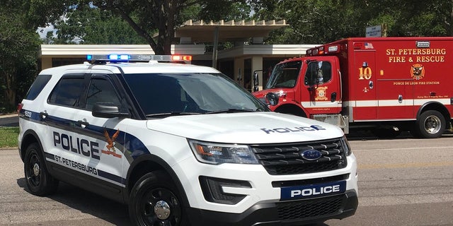 The St. Petersburg Police Department, whose vehicle is shown here at a different location, said Friday that detectives and a dive team are searching the apartment complex where 2-year-old Taylen Mosley last was seen.