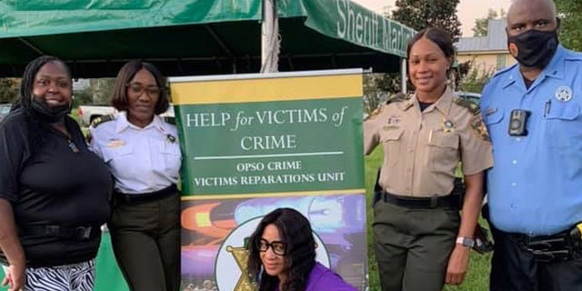 Tamara Jackson, left, considers herself a liason between law enforcement and victims' families in New Orleans.