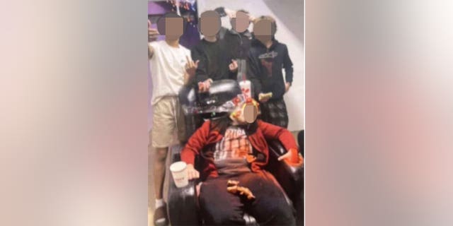 Georgia police are investigating whether this photo posted to social media shows Trent Lehrkamp passed out in a chair after a horrific hazing incident that has left him clinging to life in the hospital.