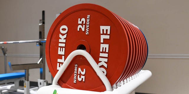 A stack of weights in the warmup room at the men's middleweight powerlifting event at The World Games 2022 July 9, 2022, at Birmingham-Jefferson Convention Complex Concert Hall in Birmingham, Ala. 