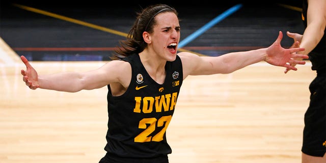 Caitlin Clark, #22 of the Iowa Hawkeyes, celebrates after the Iowa Hawkeyes beat the South Carolina Gamecocks 77-73 during the 2023 NCAA Women's Basketball Tournament Final Four semifinal game at American Airlines Center on March 31, 2023, in Dallas, Texas. 